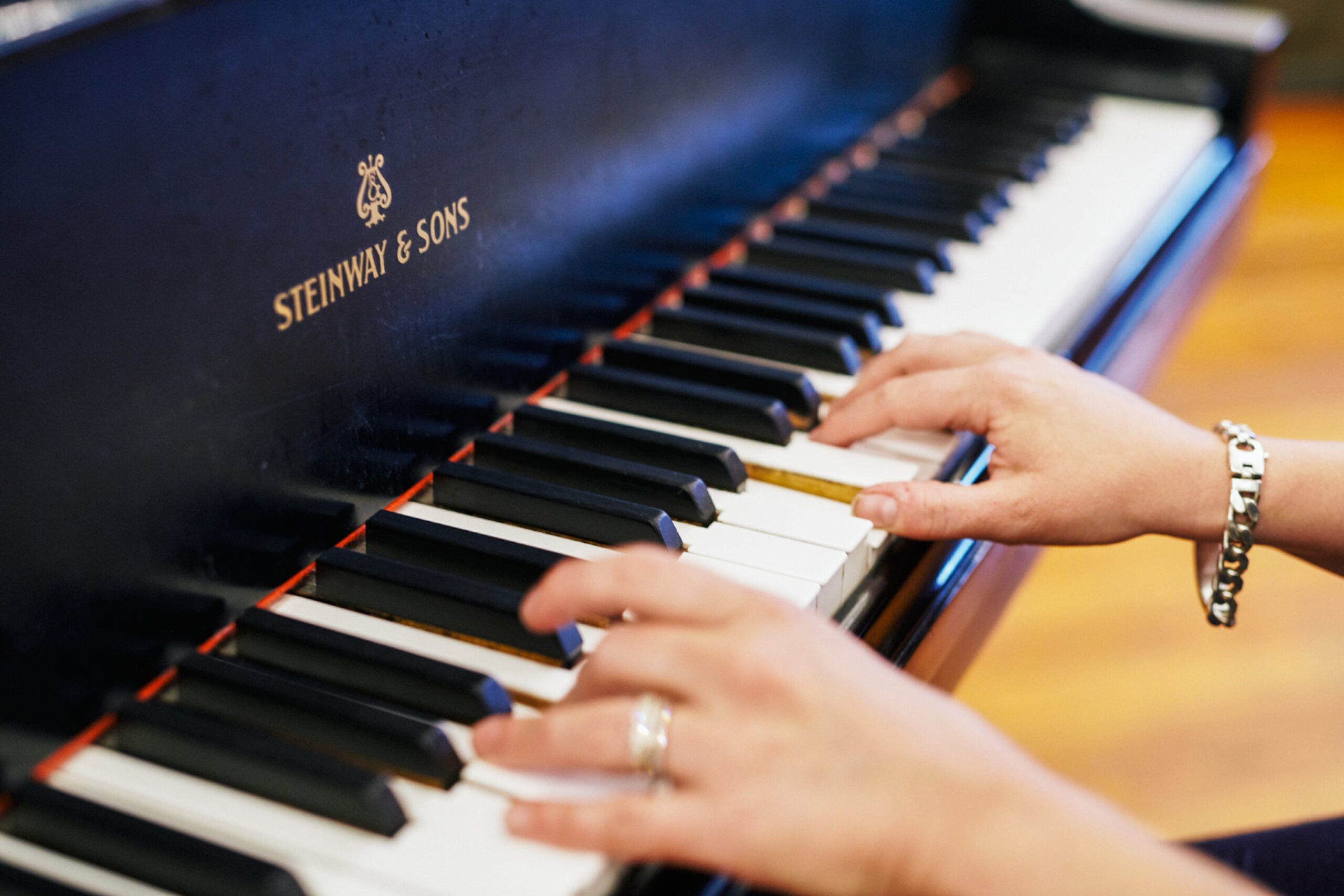 Photo of piano at Clubhouse by Madonna+Child Creative Studio